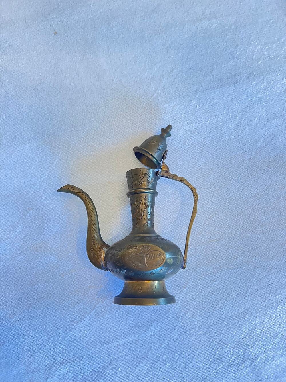 Vintage Middle Eastern etched brass teapot